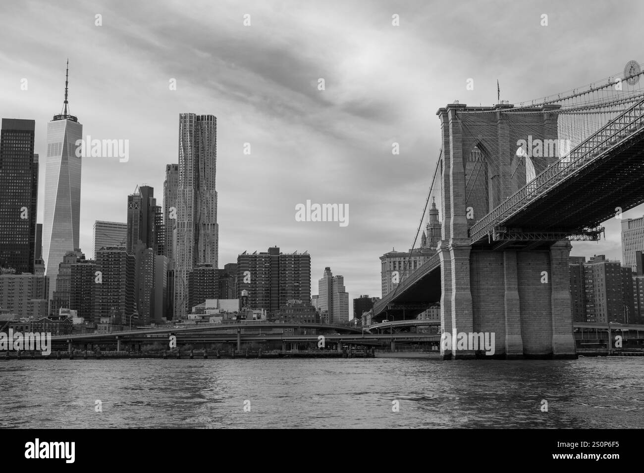 The bridges that span New York City's East River include the Brooklyn, Manhattan and Williamsburg bridges, each a famous landmark in their own right Stock Photo