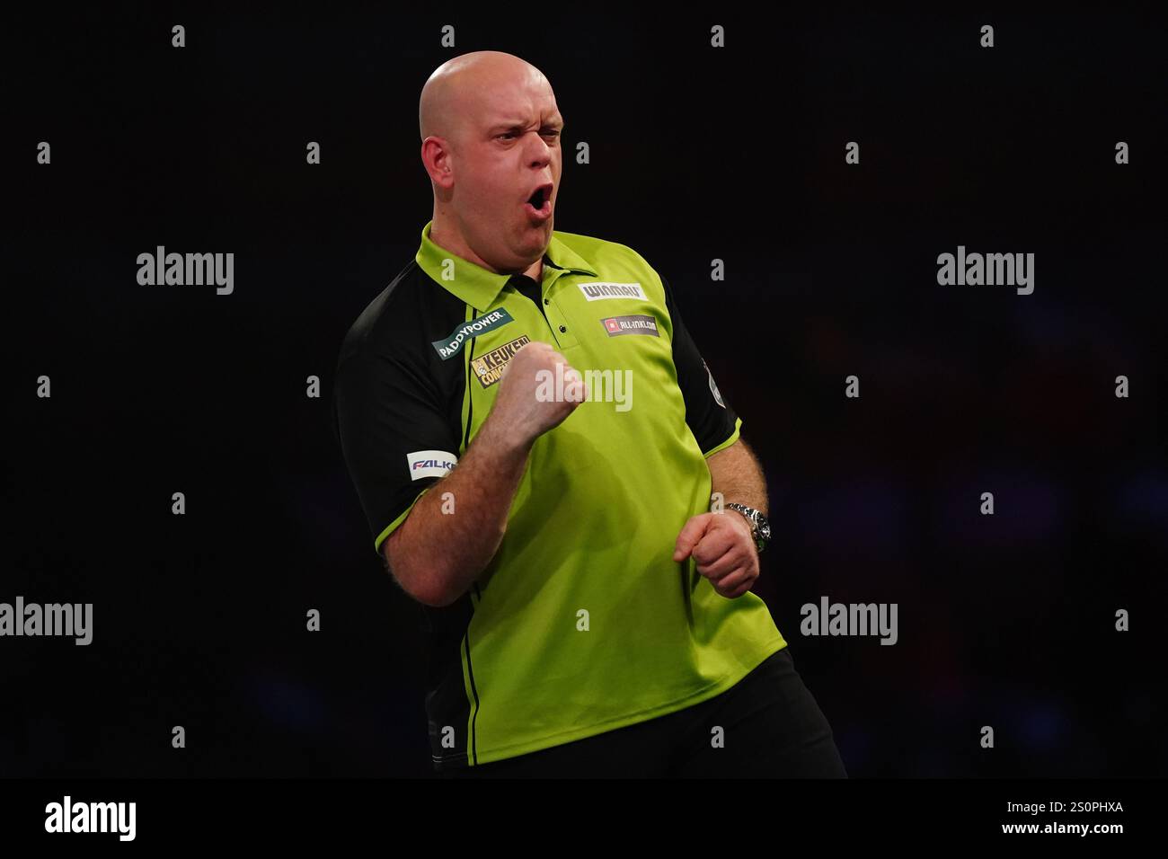 Michael van Gerwen celebrates after winning his third round match