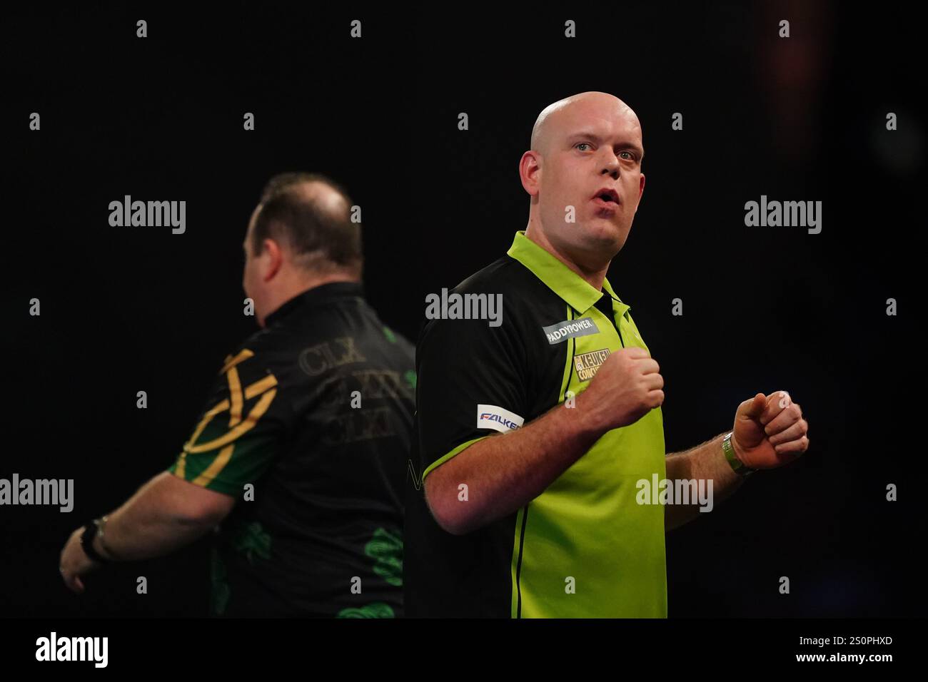 Michael van Gerwen celebrates after winning his third round match Michael van Gerwen celebrates after winning his third round match