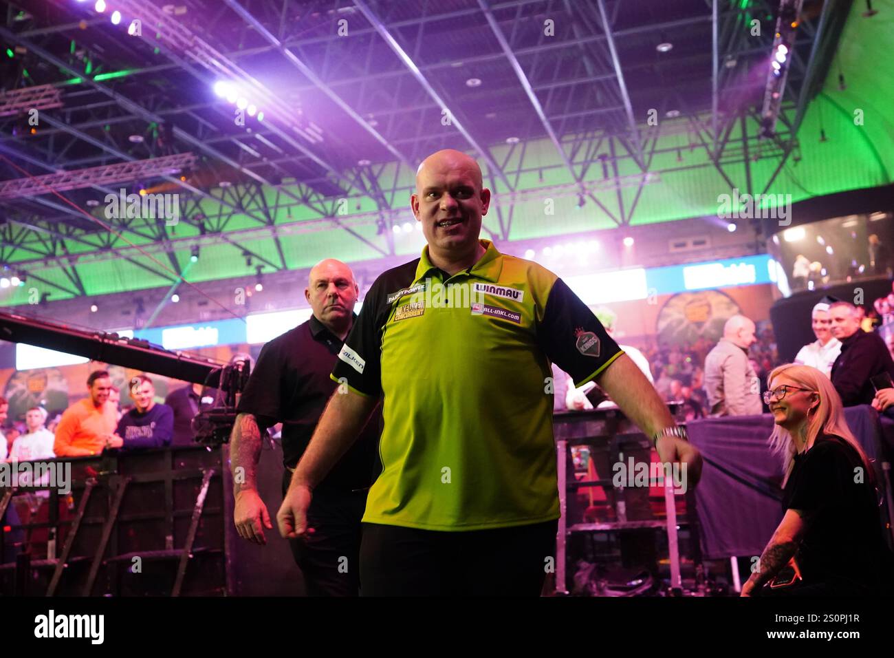 Michael van Gerwen celebrates after winning his third round match