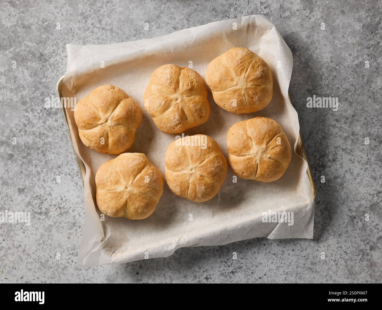 freshly baked bread buns, top view Stock Photo