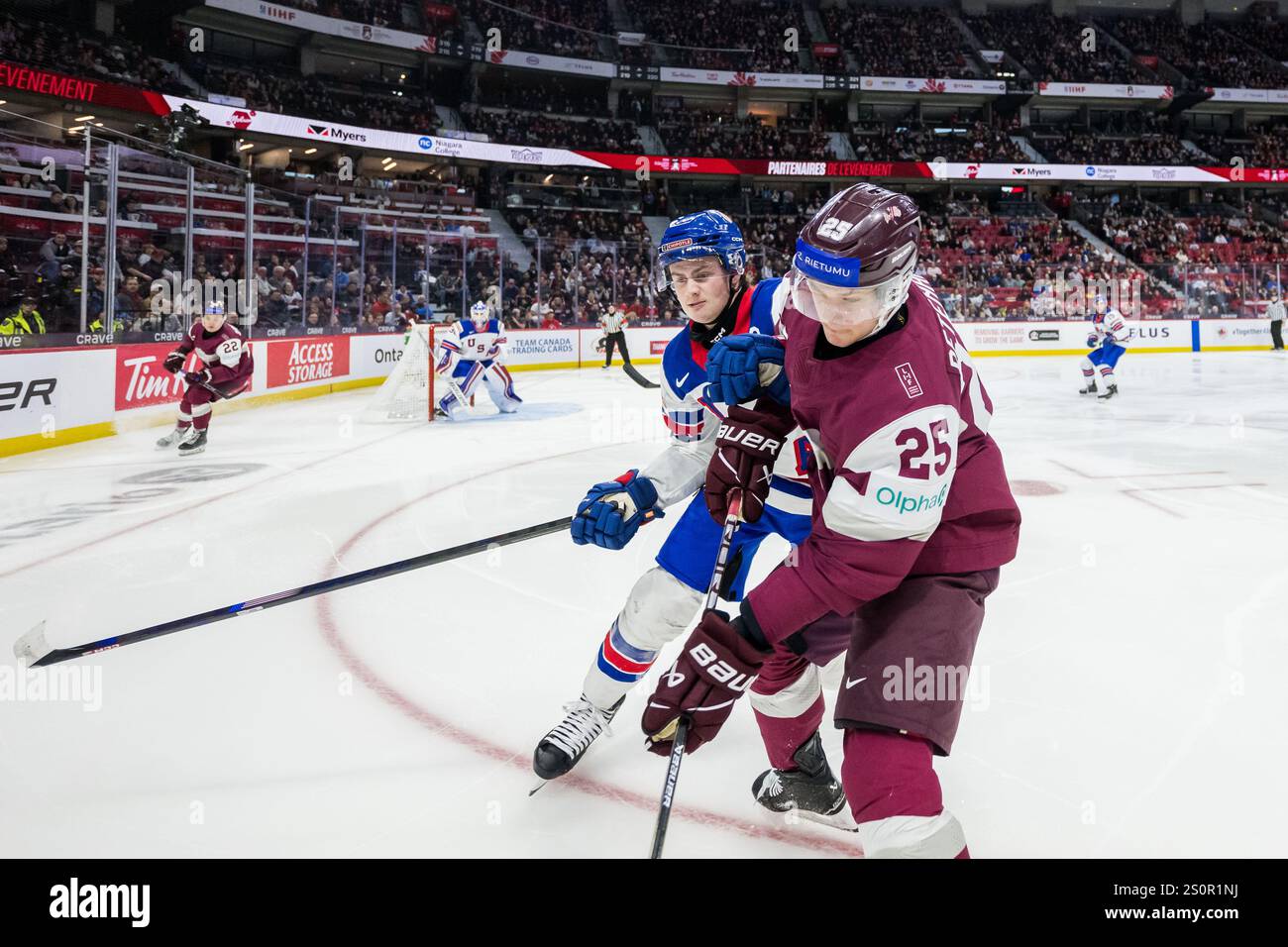 241228 Danny Nelson of USA and Krists Retenais of Latvia during the