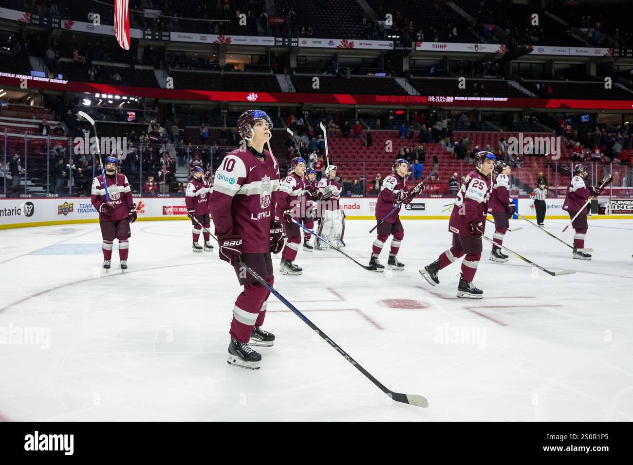 241228 Harijs Cjunkis of Latvia looks dejected after the 2025 IIHF