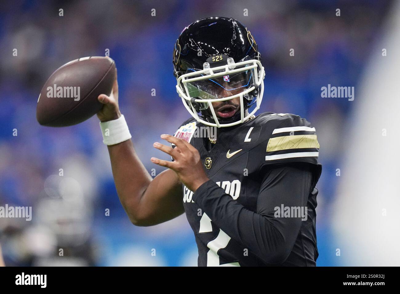 Colorado quarterback Shedeur Sanders (2) warms up for the Alamo Bowl