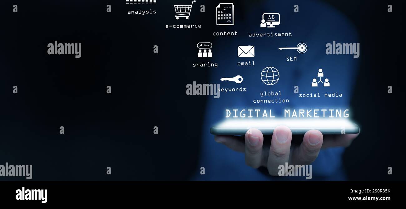 Digital marketing and advertising. A man using online advertisement and digital ad, many icons on virtual screen, using his tablet computer. Stock Photo