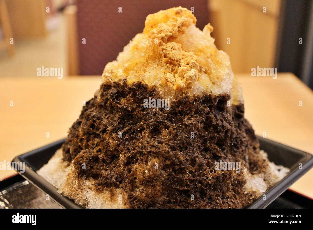 Hojicha Kakigori (Japanese shaved ice dessert) with kinako (roasted soybean flour) in Tokyo, Japan Stock Photo