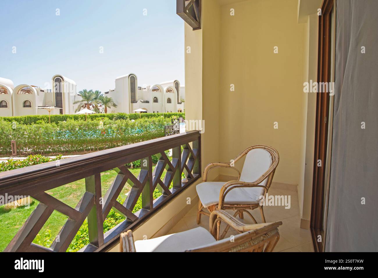 Terrace furniture of a luxury apartment in tropical resort with ...