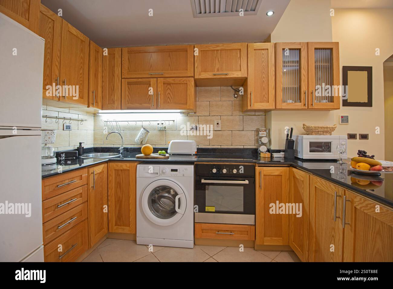 Photo inspiration: Curated Kitchen Appliances In Luxury Apartments Gallery View 34