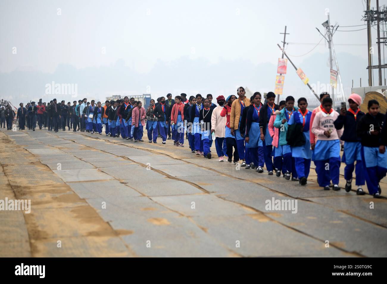 Prayagraj Scout and Guide cadets walking in queue to Visit Sangam