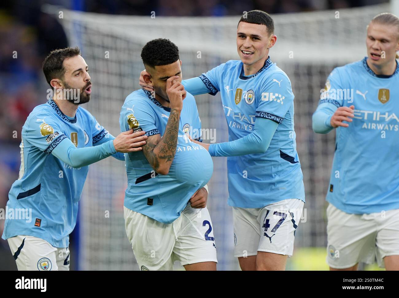 Manchester City's Savinho (second left) celebrates scoring their side's