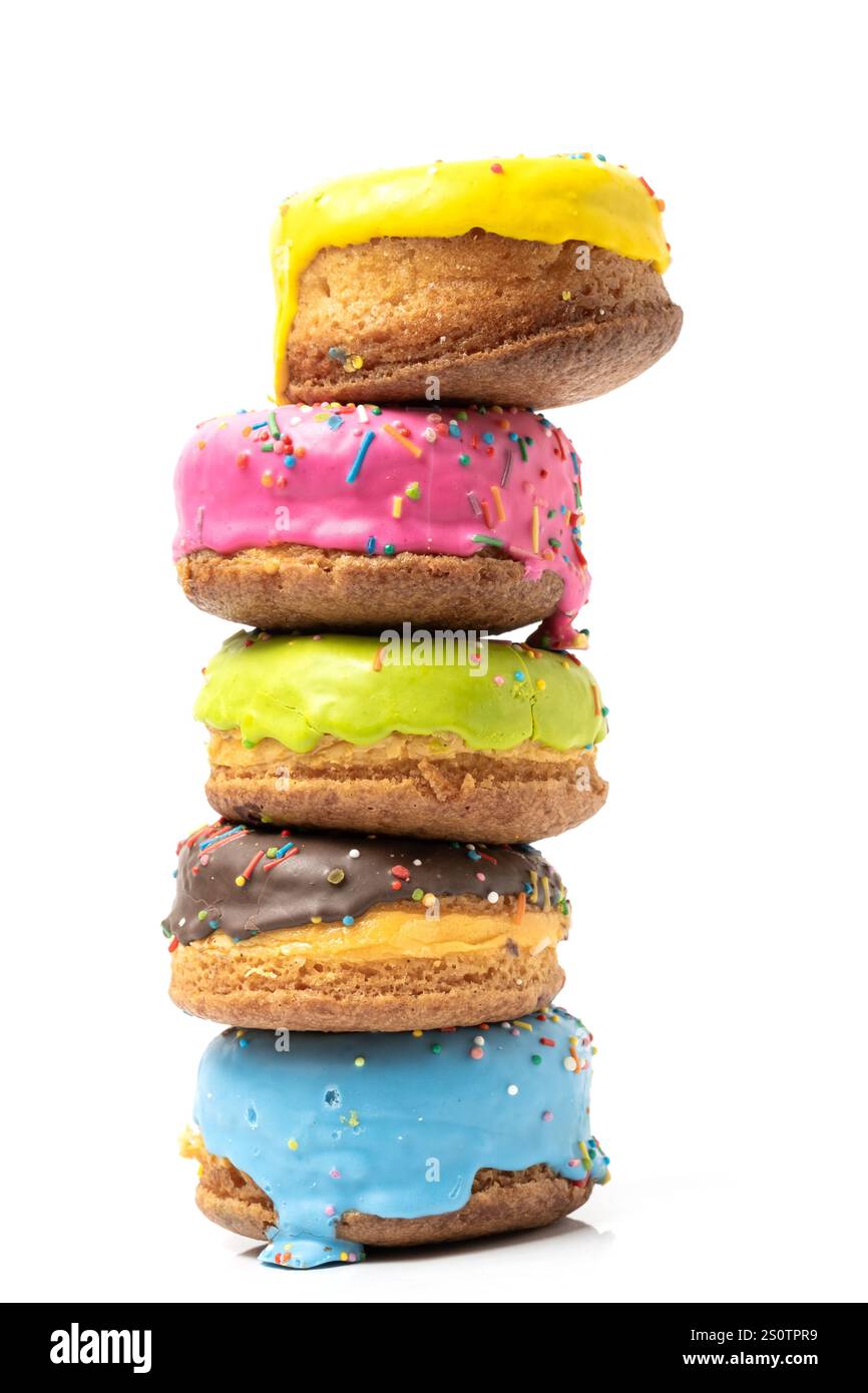 Stack of colorful donuts isolated on white background Stock Photo