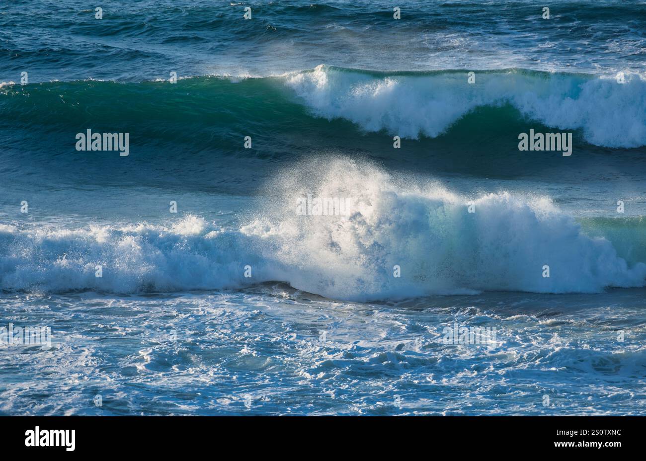 Powerful ocean waves crashing on the shore, showcasing the raw energy ...