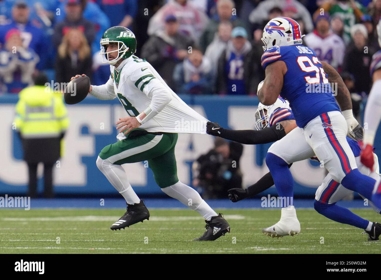 New York Jets quarterback Aaron Rodgers (8) looks to pass against the
