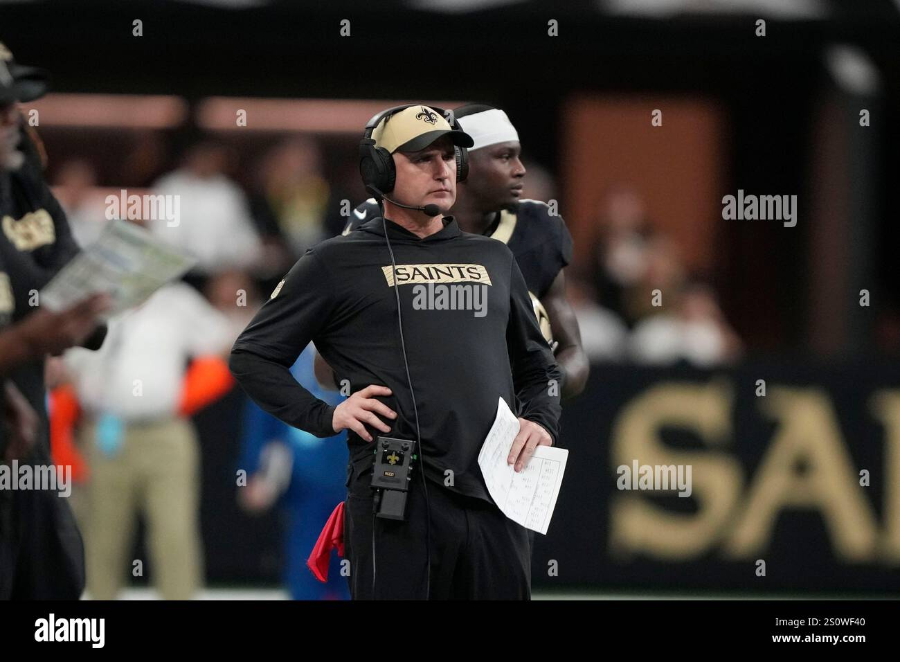 New Orleans Saints interim head coach Darren Rizzi watches from the ...