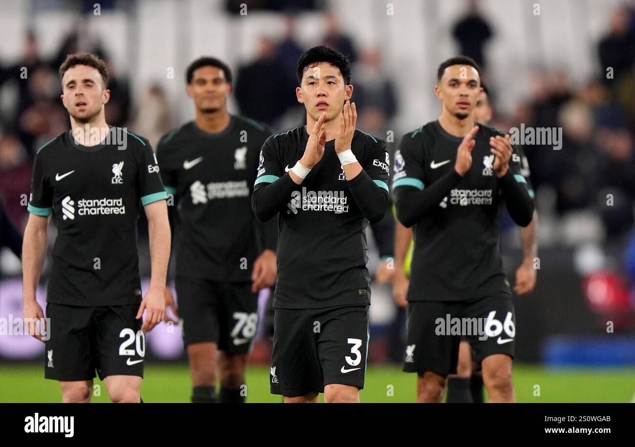 Liverpool's Wataru Endo applauds the fans after the Premier League ...