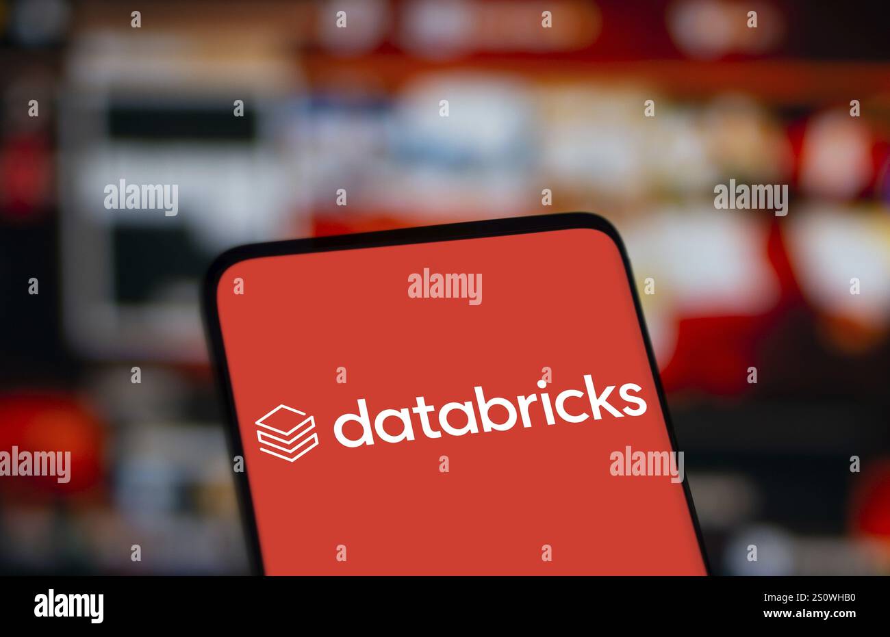 Databricks logo is displayed on smartphone. Databricks Inc is a global ...