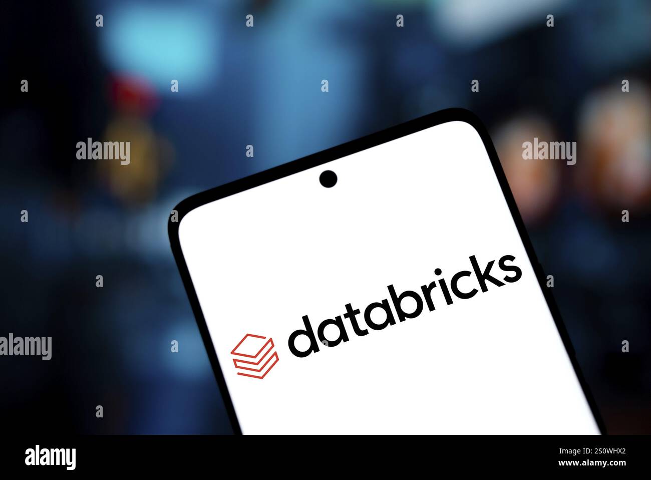 Databricks logo is displayed on smartphone. Databricks Inc is a global ...