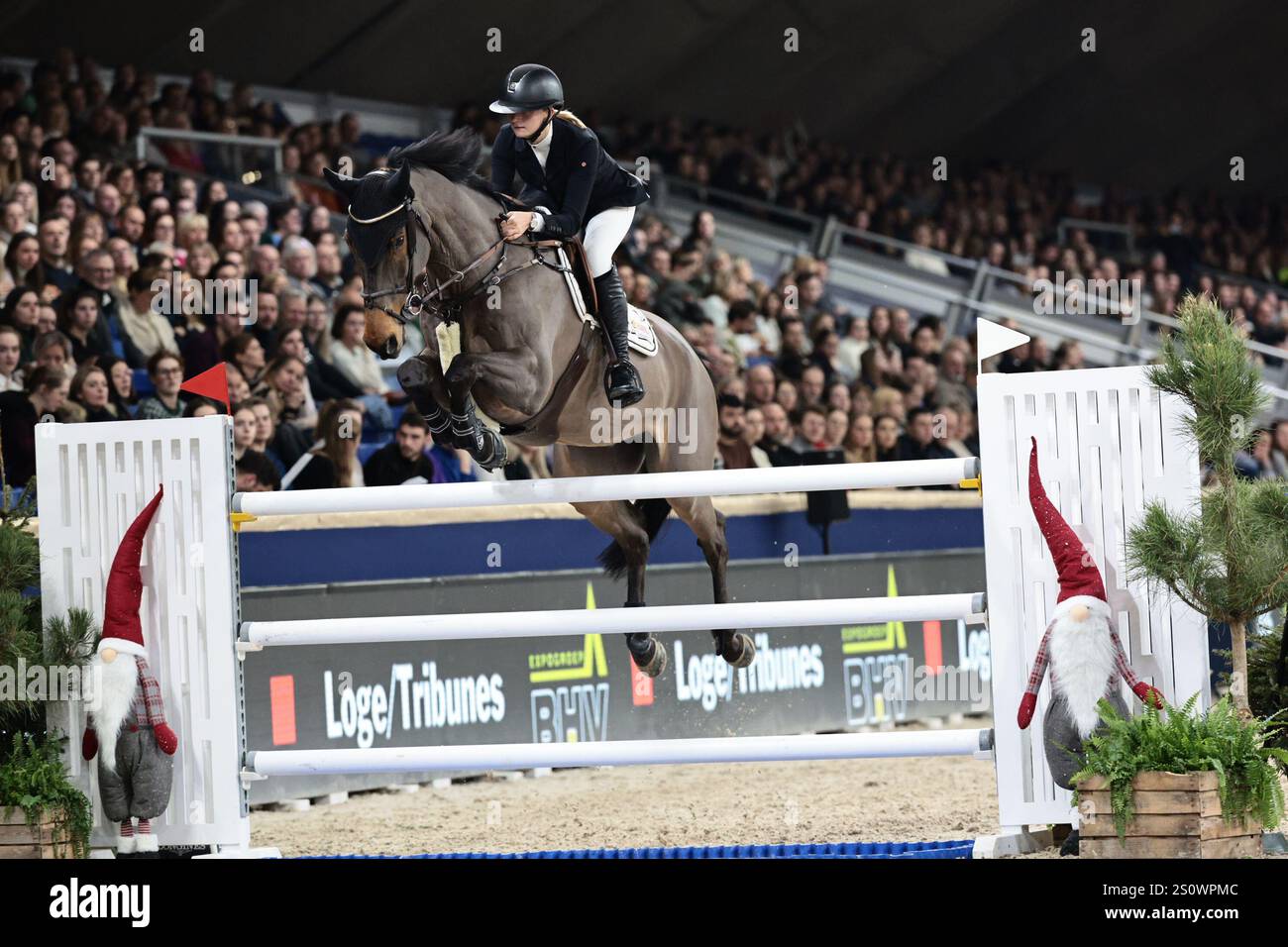 Laura Baaring Kjaergaard of Denmark with Guppie VDL during the Jumping ...