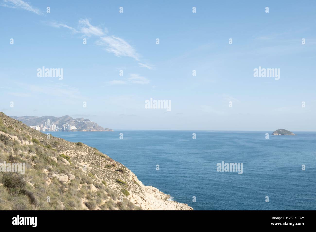 Benidorm, Alicante province, Spain. View to popular Spanish resort Benidorm, Benidorm island and Mediterranean Sea from Serra Gelada national park Stock Photo