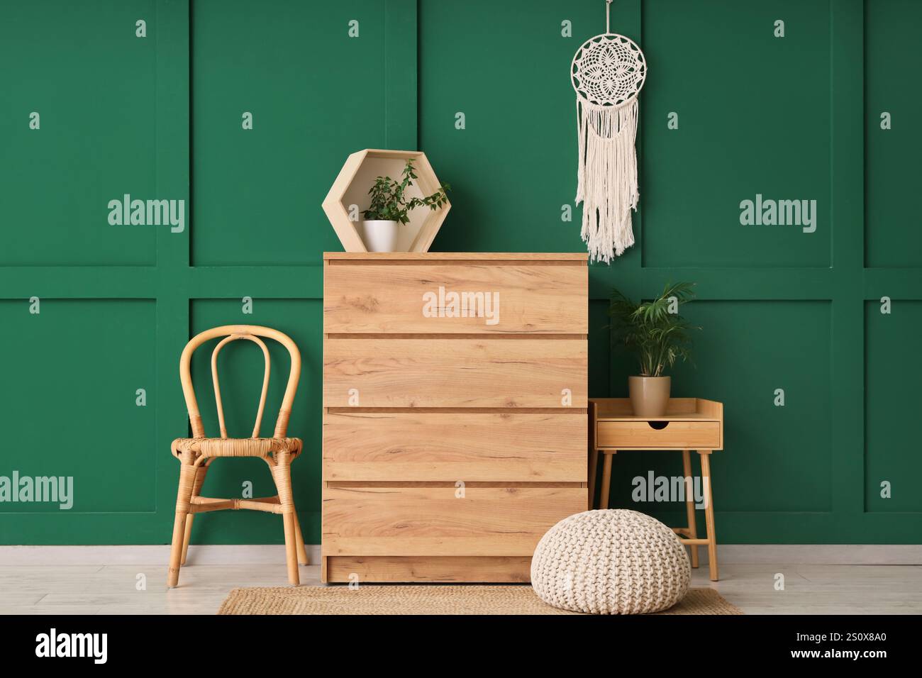 Interior of living room with wooden commode, chair and table Stock ...