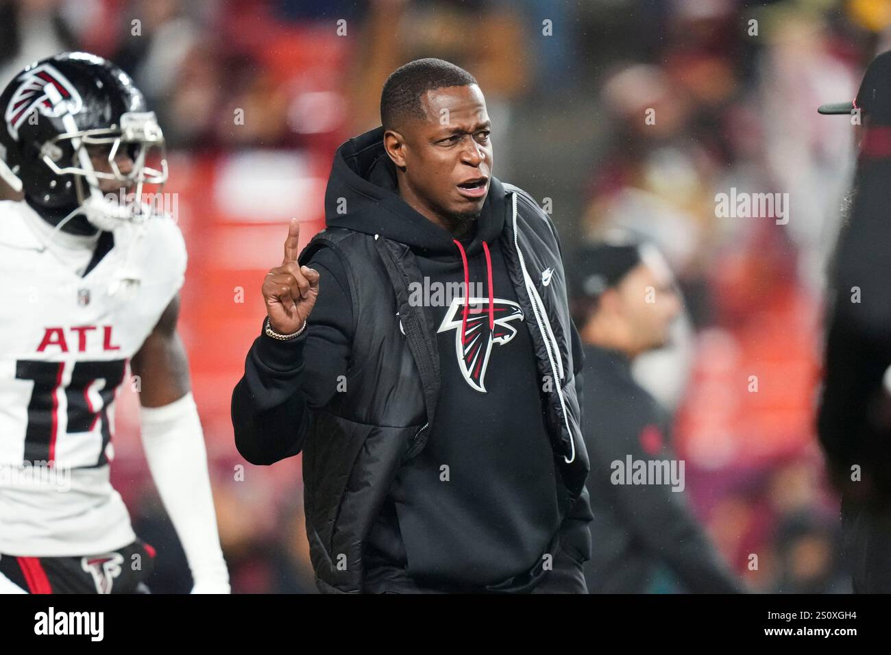 Atlanta Falcons head coach Raheem Morris walks on the field before an