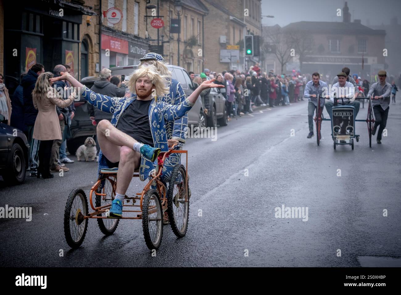 Pram Racing Boxing Day Pram Race in Crewkerne. Hundreds of locals line the streets ...