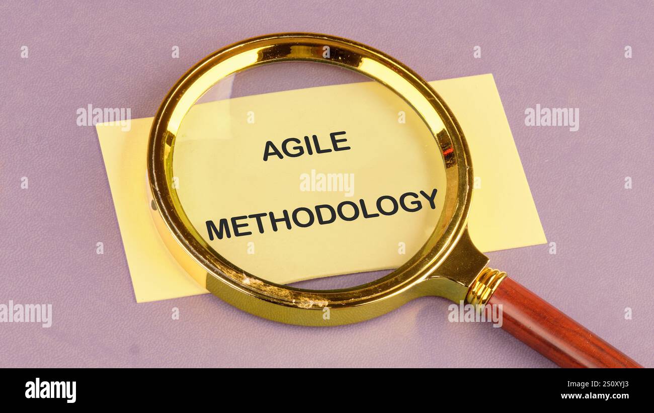 Fast changes concept. AGILE METHODOLOGY on the yellow card, top view. Stock Photo