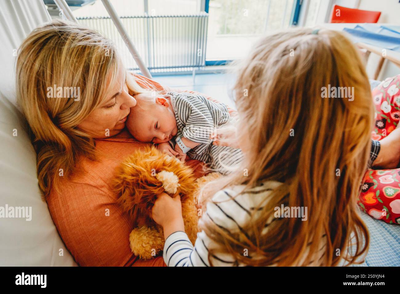 Baby sleeping on mom chest hi-res stock photography and images - Alamy