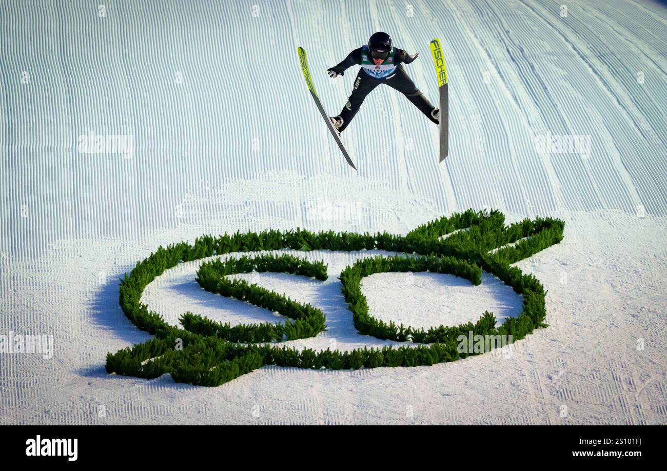 Andrew Urlaub, USA in flight action at the 73. Four Hills Tournament ...