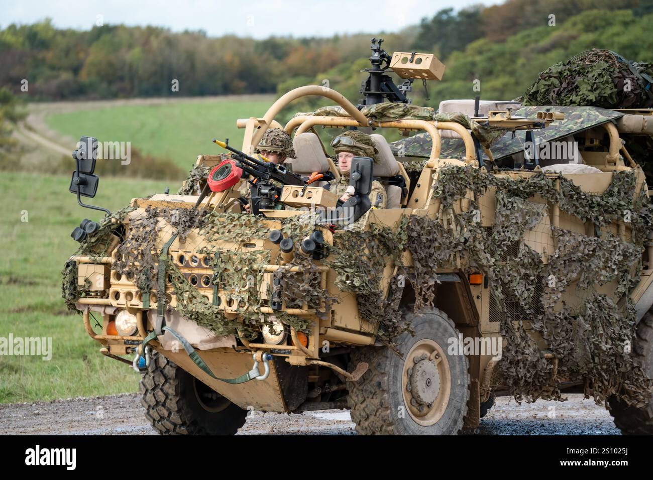 close-up of a British army Supacat Jackal 4x4 vehicle in action on a