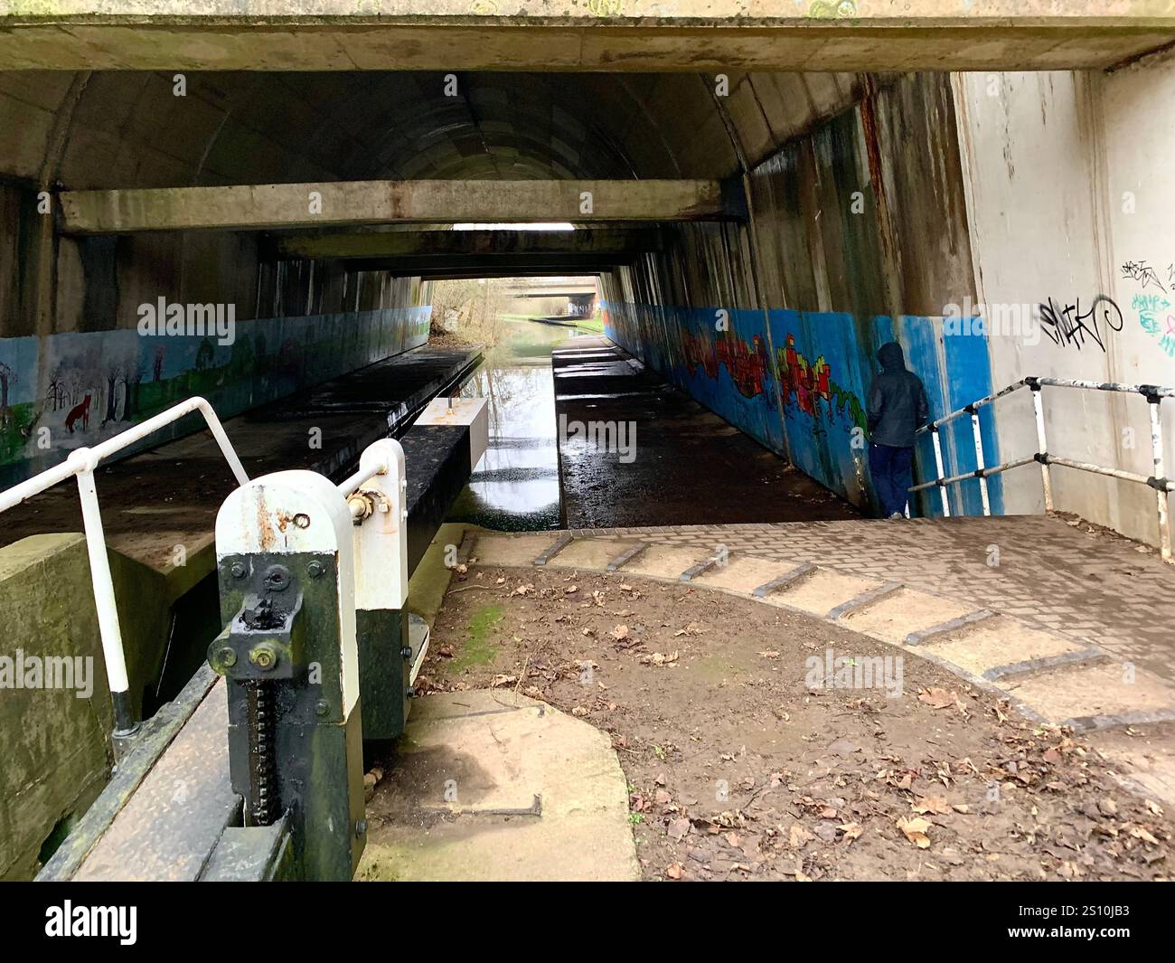 Northampton Northamptonshire boat water canal people place man walk walking countryside amble cold winter weather path track ship narrow boat - Smartphone Captured Stock Image