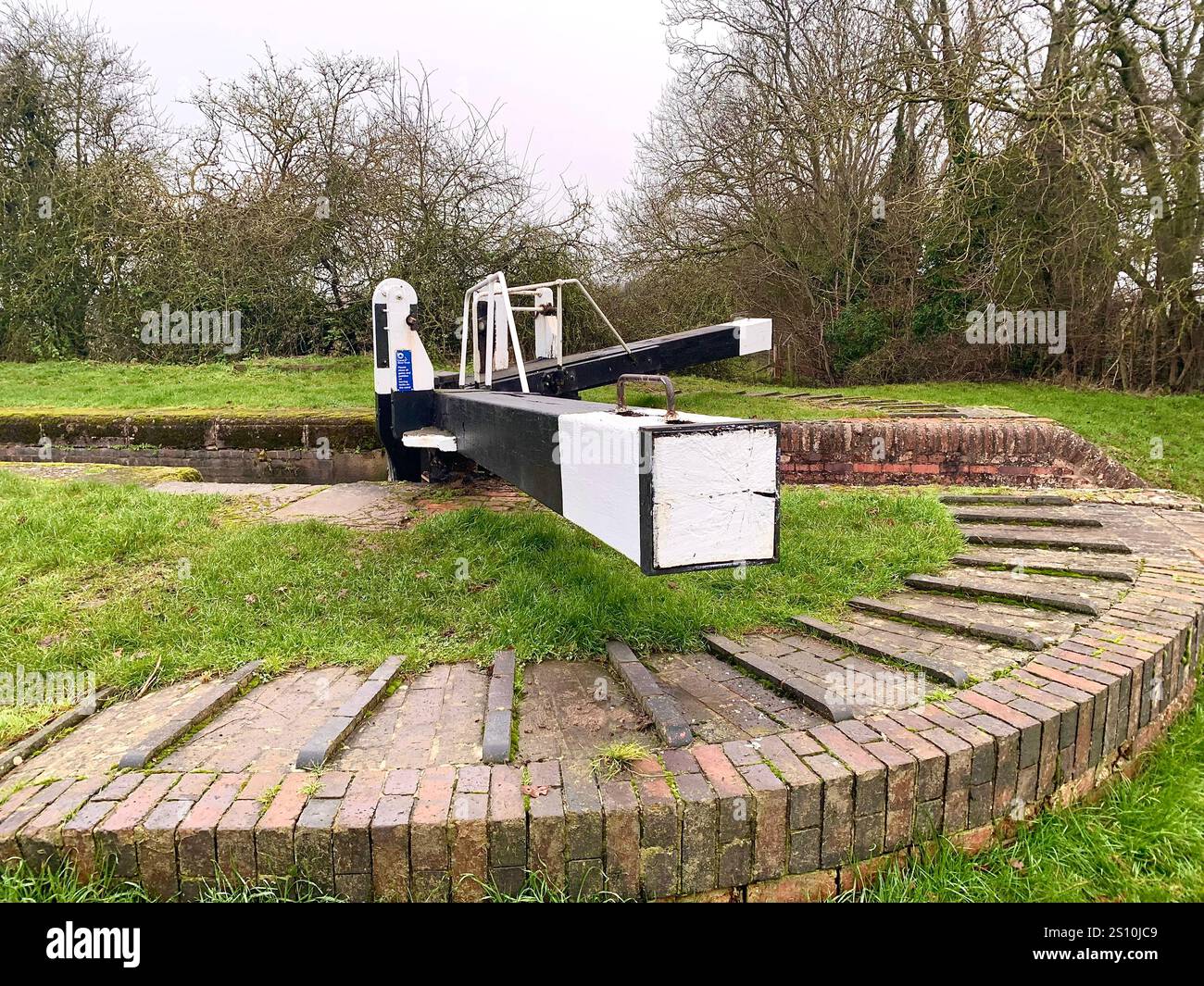 Northampton Northamptonshire boat water canal people place man walk walking countryside amble cold winter weather path track ship narrow boat - Smartphone Captured Stock Image