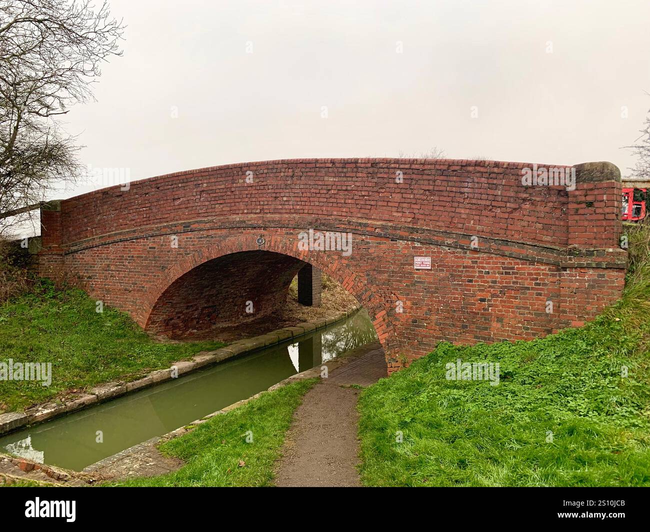 Northampton Northamptonshire boat water canal people place man walk walking countryside amble cold winter weather path track ship narrow boat - Smartphone Captured Stock Image