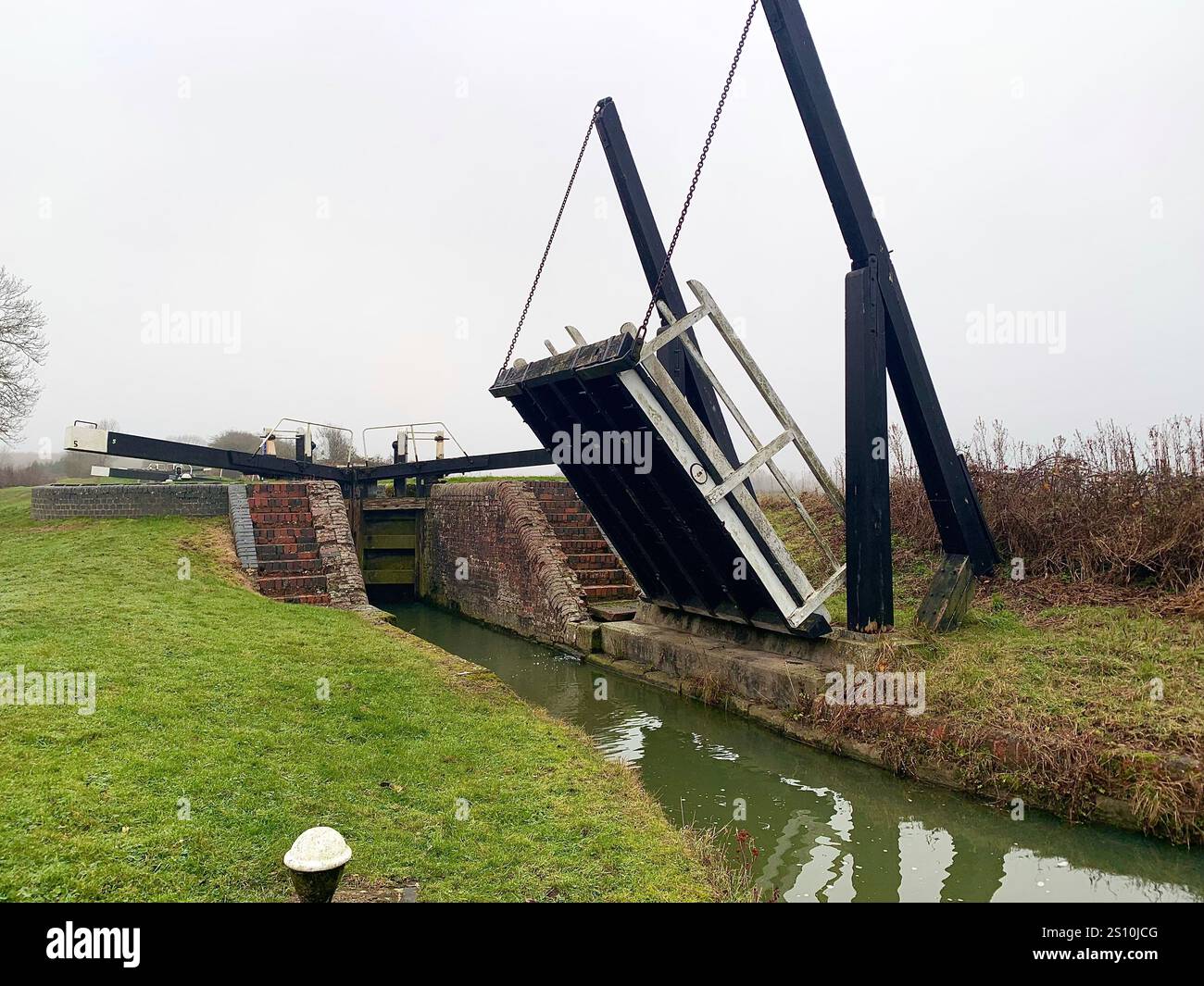 Northampton Northamptonshire boat water canal people place man walk walking countryside amble cold winter weather path track ship narrow boat - Smartphone Captured Stock Image