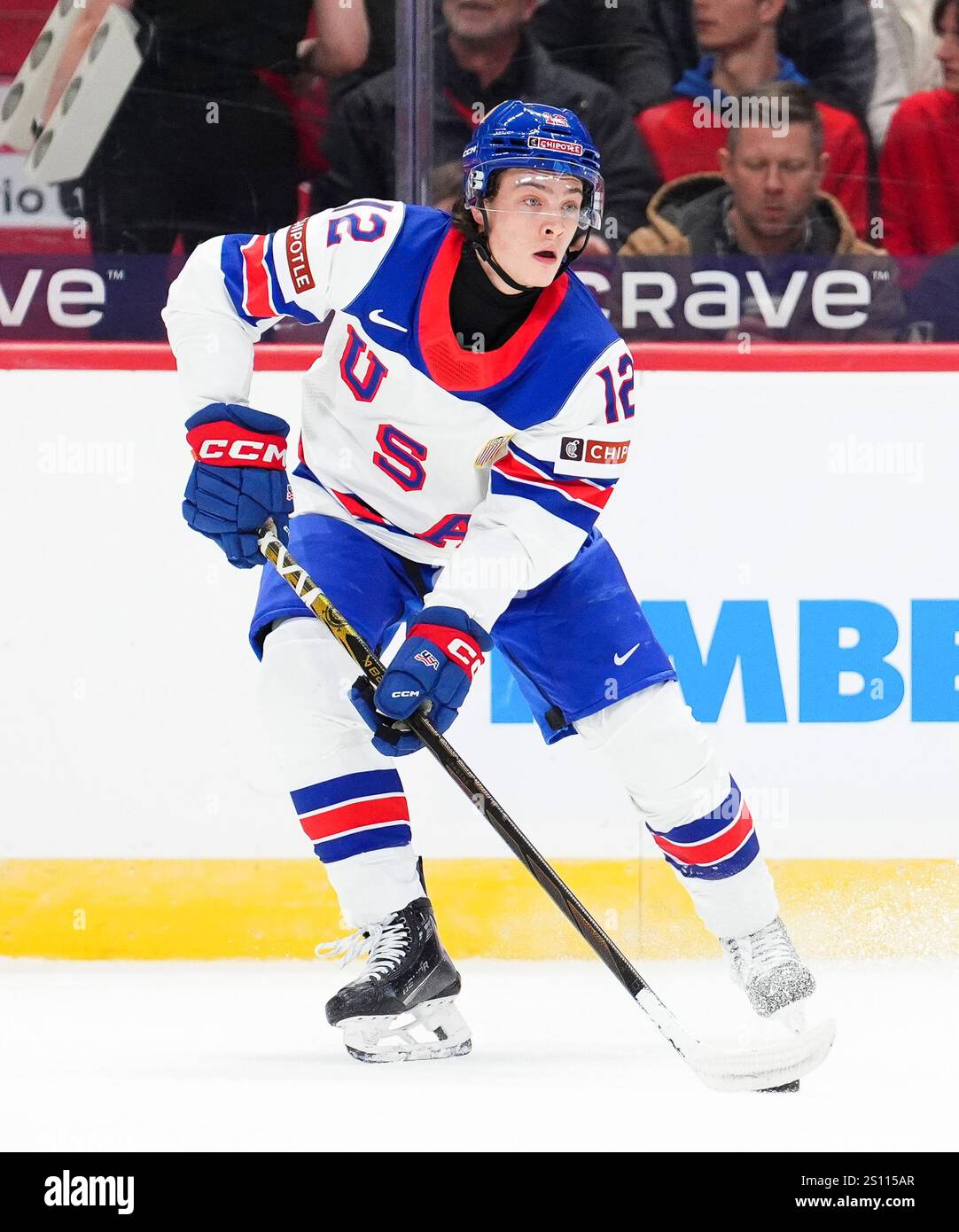 USA's James Hagens (12) plays Germany during 2025 IIHF World Junior