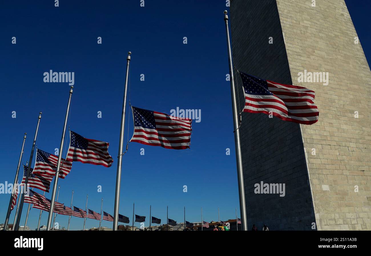 Flags Surrounding The Washington Monument Are Lowered To Half Staff