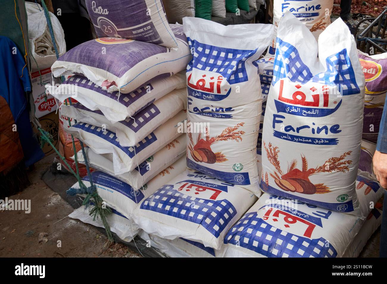 sacks of flour for sale at traditional berber market day amazigh market asni morocco Stock Photo