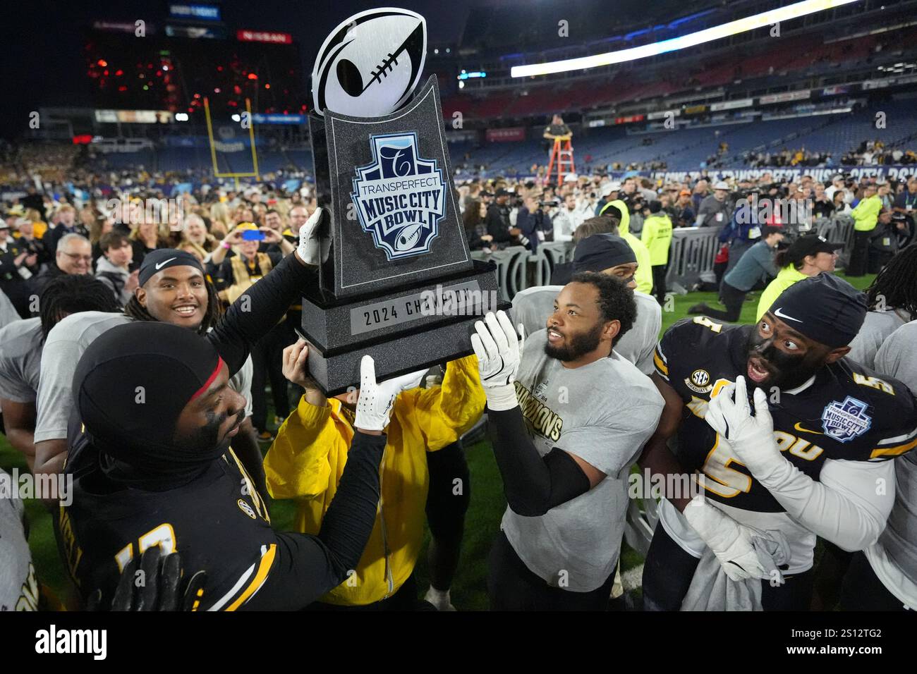 Missouri players celebrate after winning the Music City Bowl NCAA