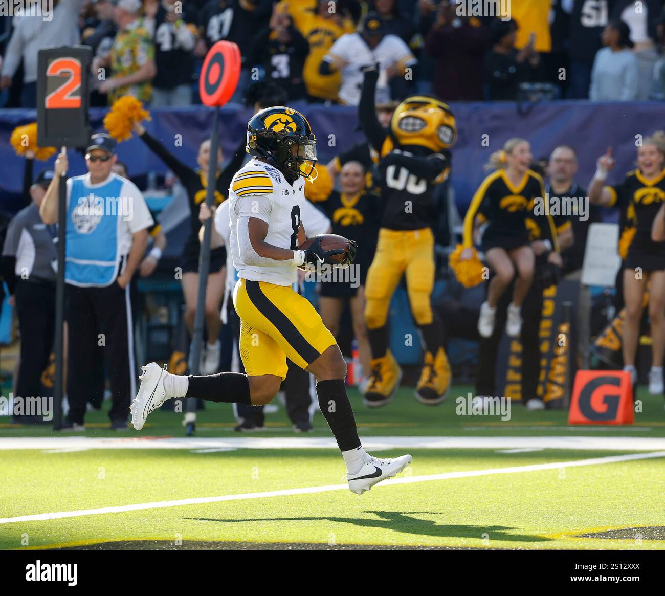 December 30, 2024 Iowa Hawkeyes RB 8 Terrell Washington, Jr. scores a