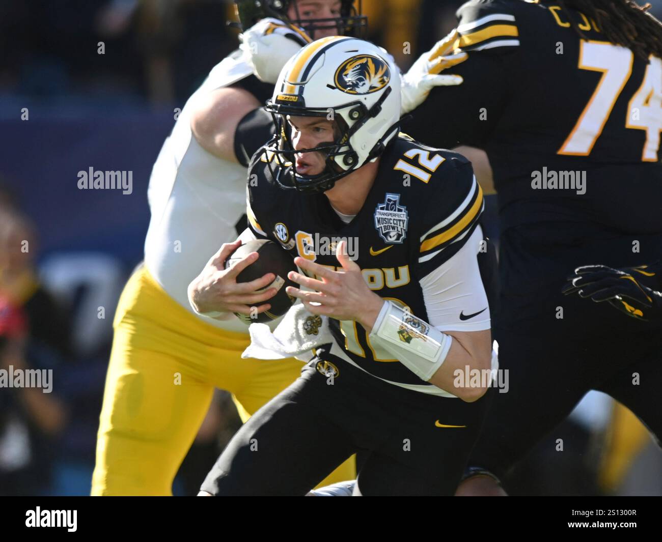 NASHVILLE, TN - DECEMBER 30: Missouri Tigers quarterback Brady Cook (12 ...