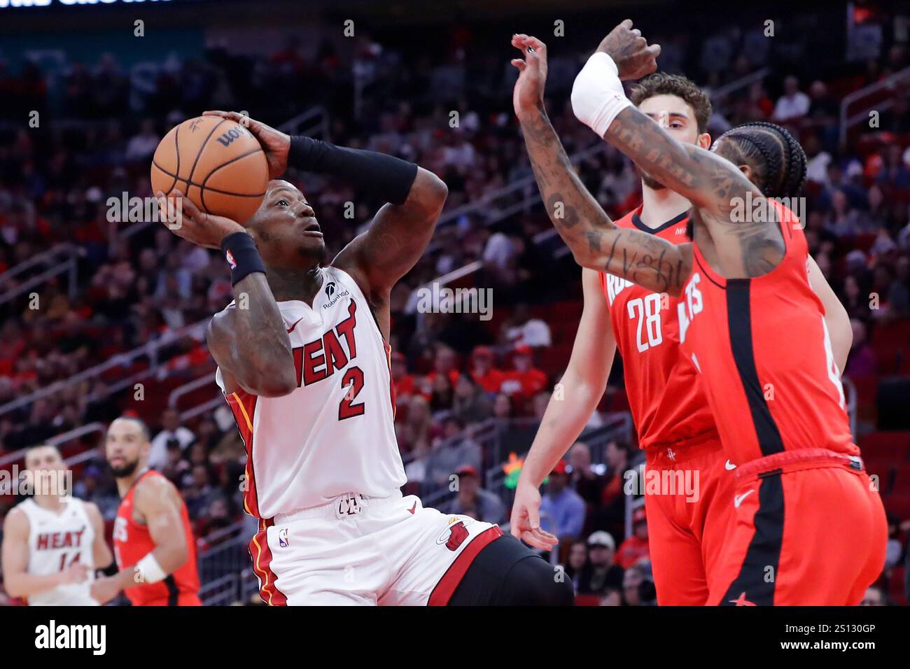 Miami Heat guard Terry Rozier III (2) puts up a shot against Houston ...