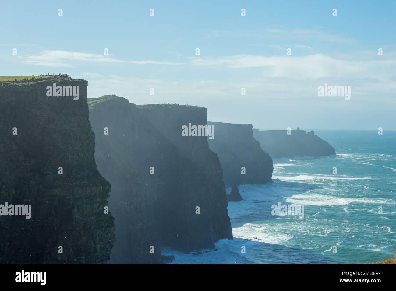 cliffs of moher ireland sunny day looking over the water Stock Photo ...