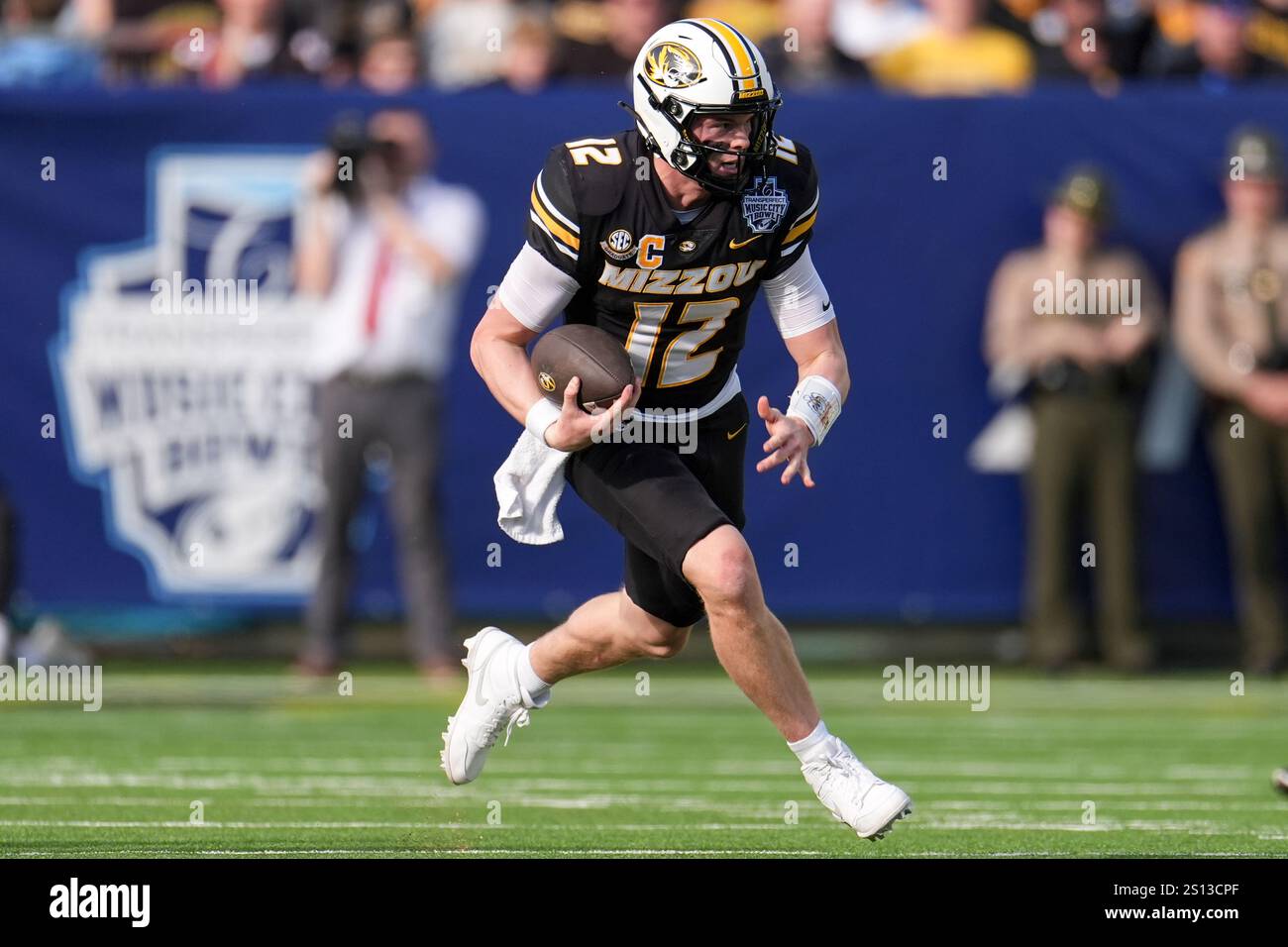 Missouri quarterback Brady Cook (12) plays during the first half of the