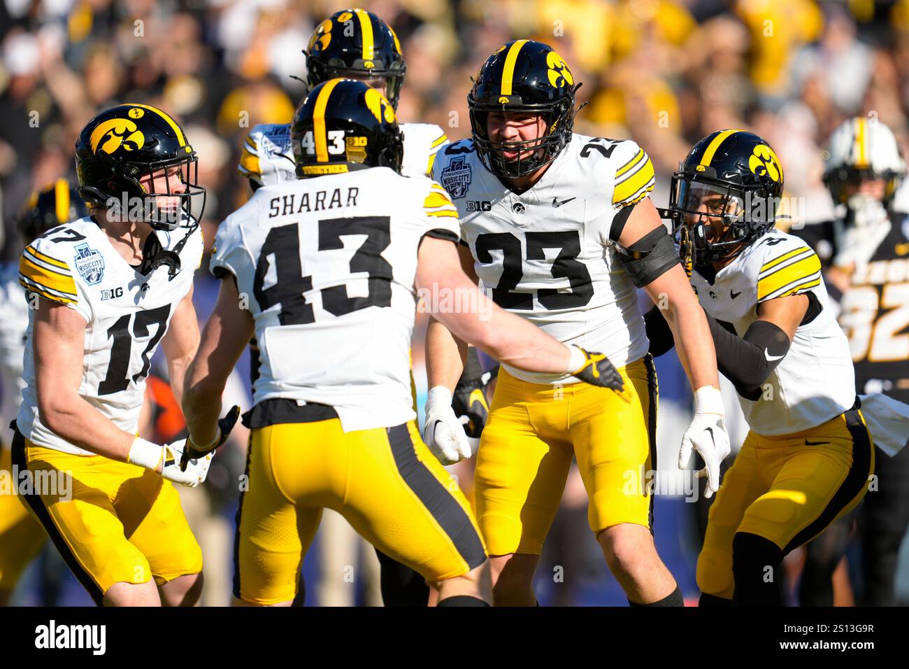 Landyn Van Kekerix (Iowa Hawkeyes, 23) celebrates with teammates after