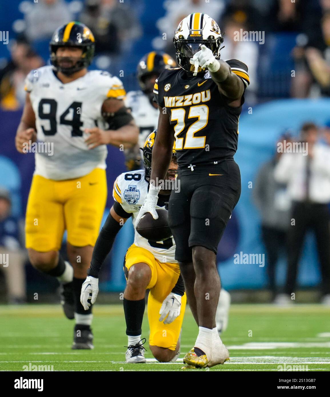 Running back Tavorus Jones (Missouri Tigers, 22) gestures after