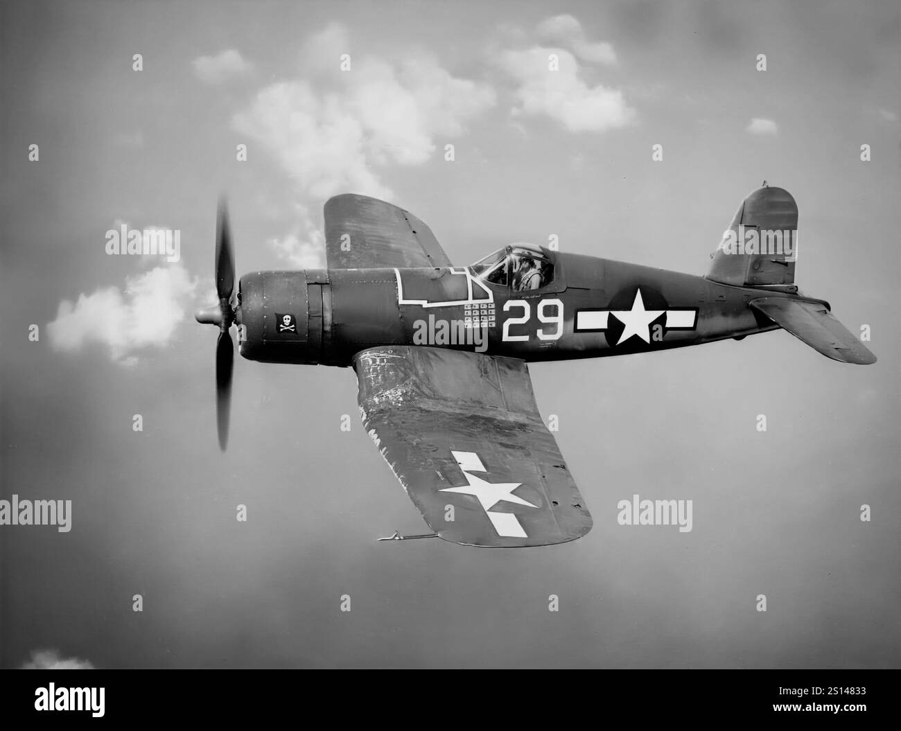 A Vought F4U Corsair in flight. An American fighter aircraft primarily of World War II and the Korean War, it was designed and principally operated as a carrier-based aircraft with the U.S. Navy and Marines. One of the most capable carrier-based fighter-bombers of the war, some Japanese pilots regarded it as the most formidable American fighter. The Corsair served almost exclusively as a fighter-bomber throughout the Korean War and during the French colonial wars in Indochina and Algeria. Stock Photo