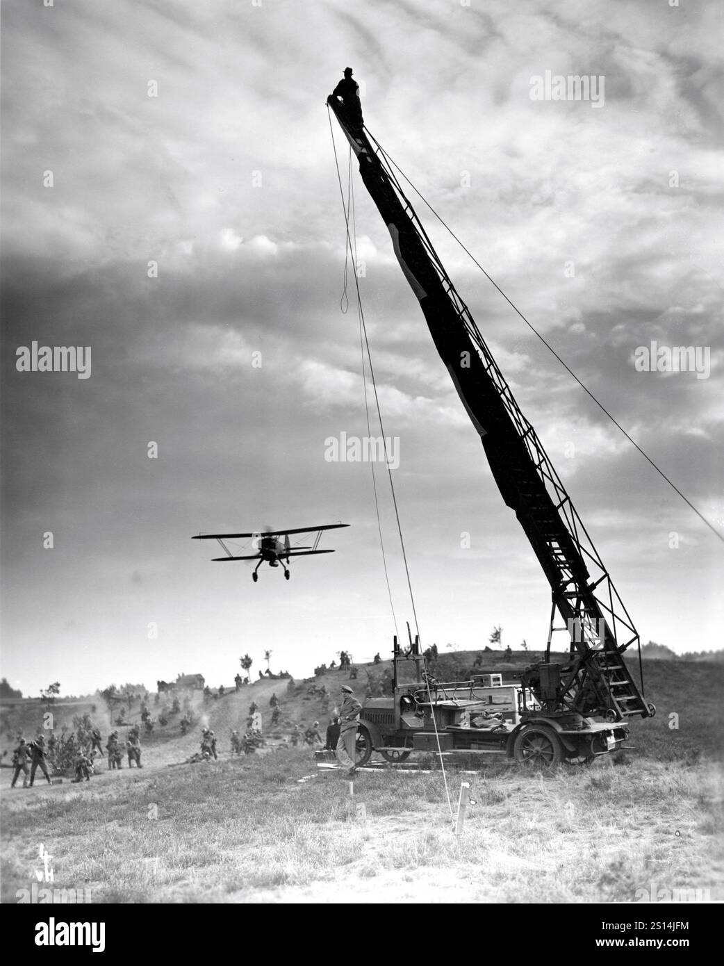 Outdoor on set candid with mobile crane during filming of Nazi soldiers ...