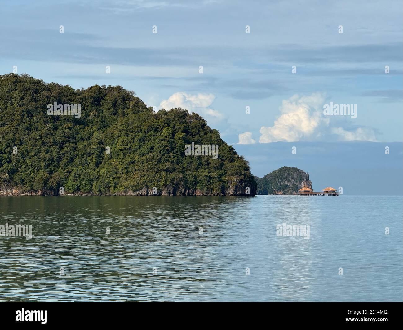 Island and beach hut by sea - Smartphone Captured Stock Image