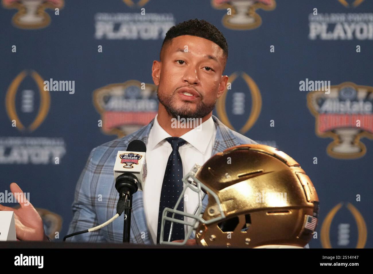 Notre Dame head coach Marcus Freeman speaks to reporters in New Orleans