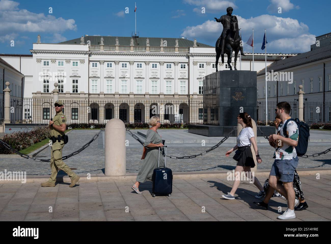 People walk in front of Presidential Palace in capital of Poland